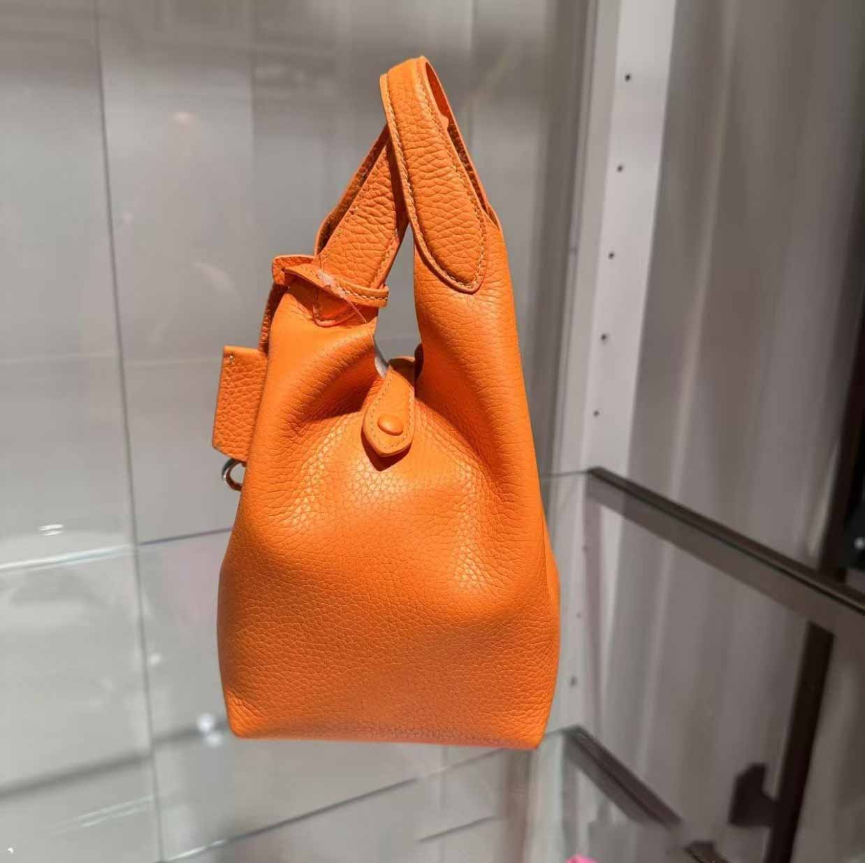 Women's new bucket bag lychee grain cowhide hand bill shoulder crossbody bag