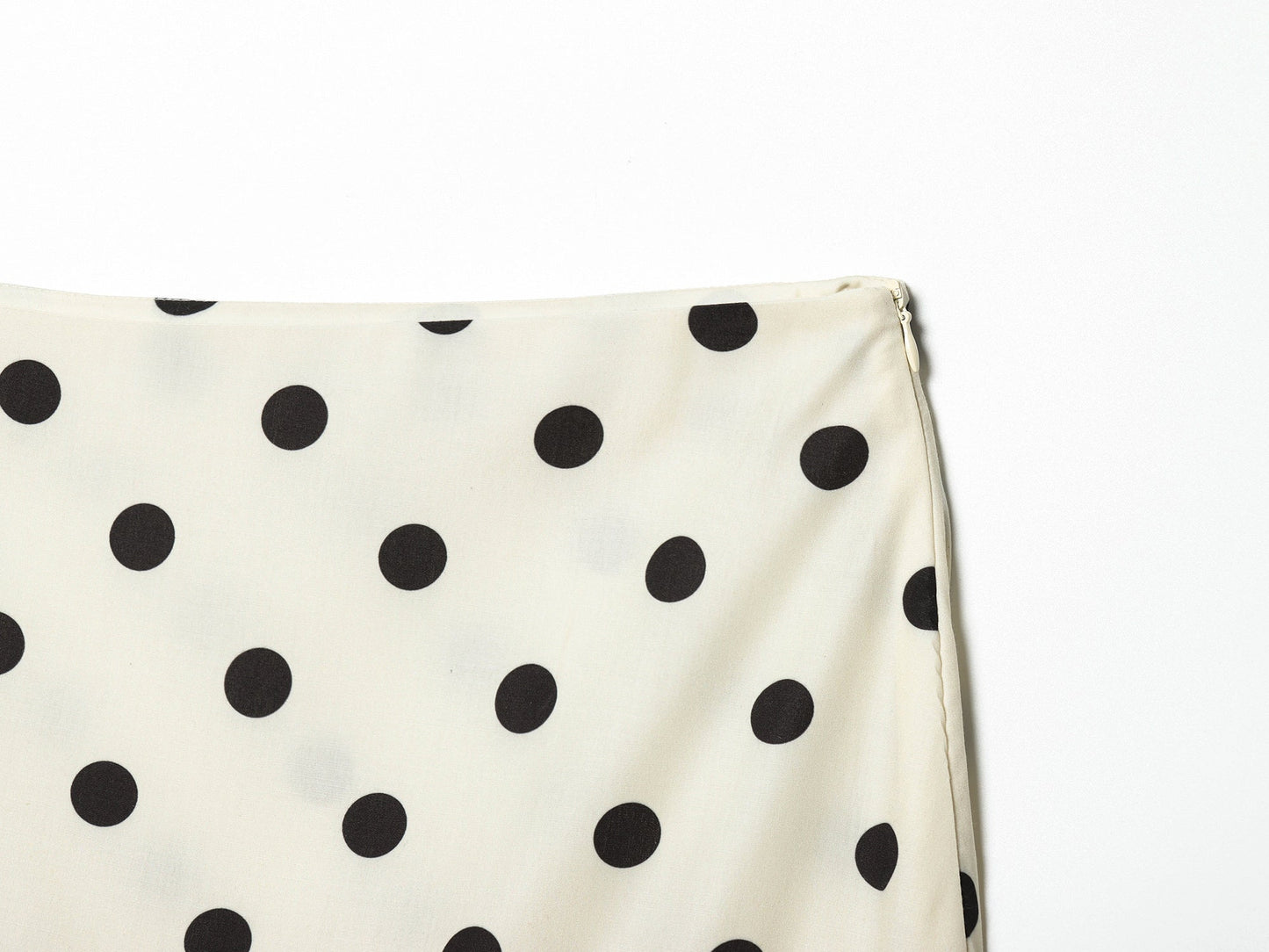 Women's asymmetrical polka dot MIDI skirt