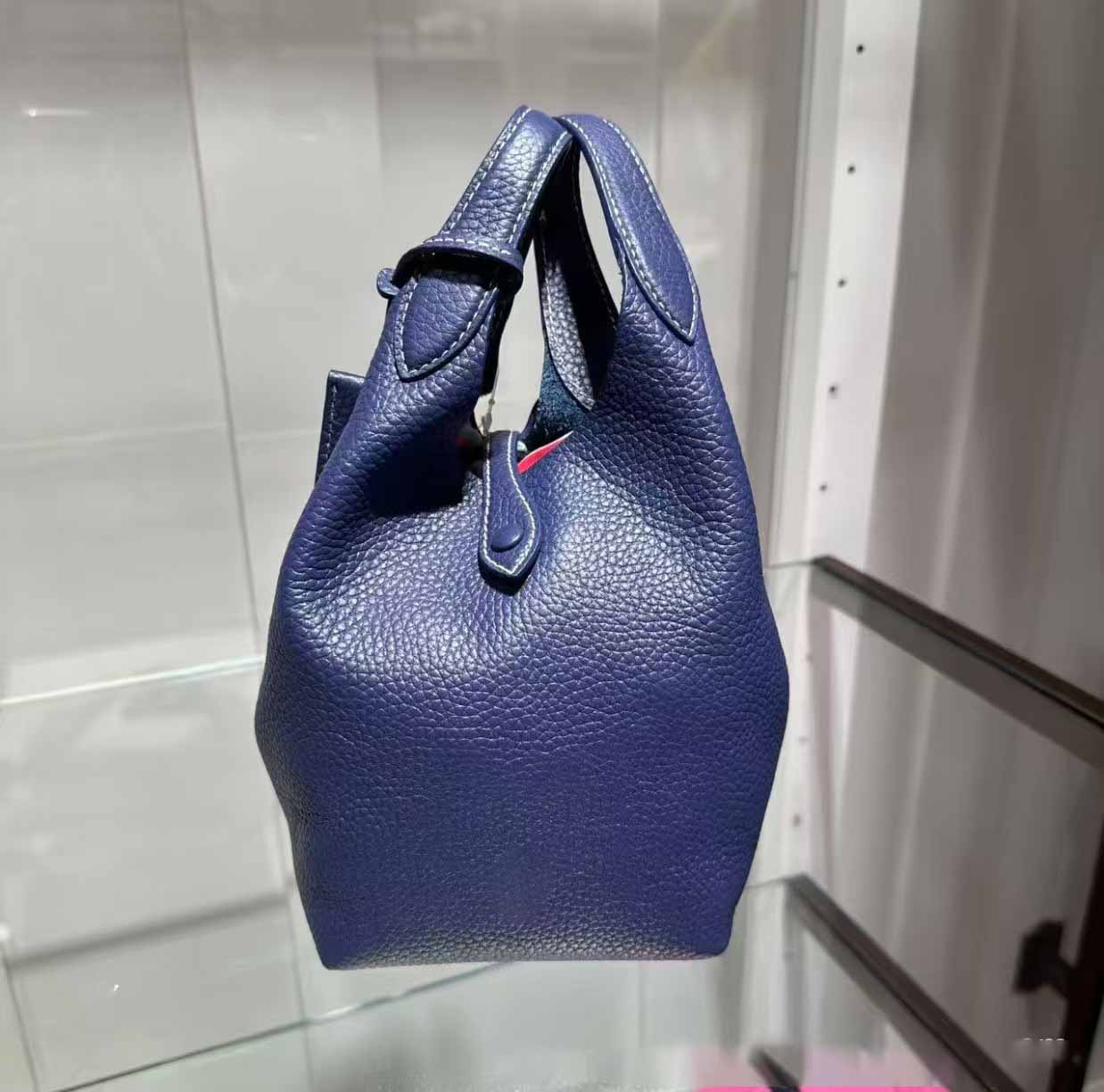 Women's new bucket bag lychee grain cowhide hand bill shoulder crossbody bag