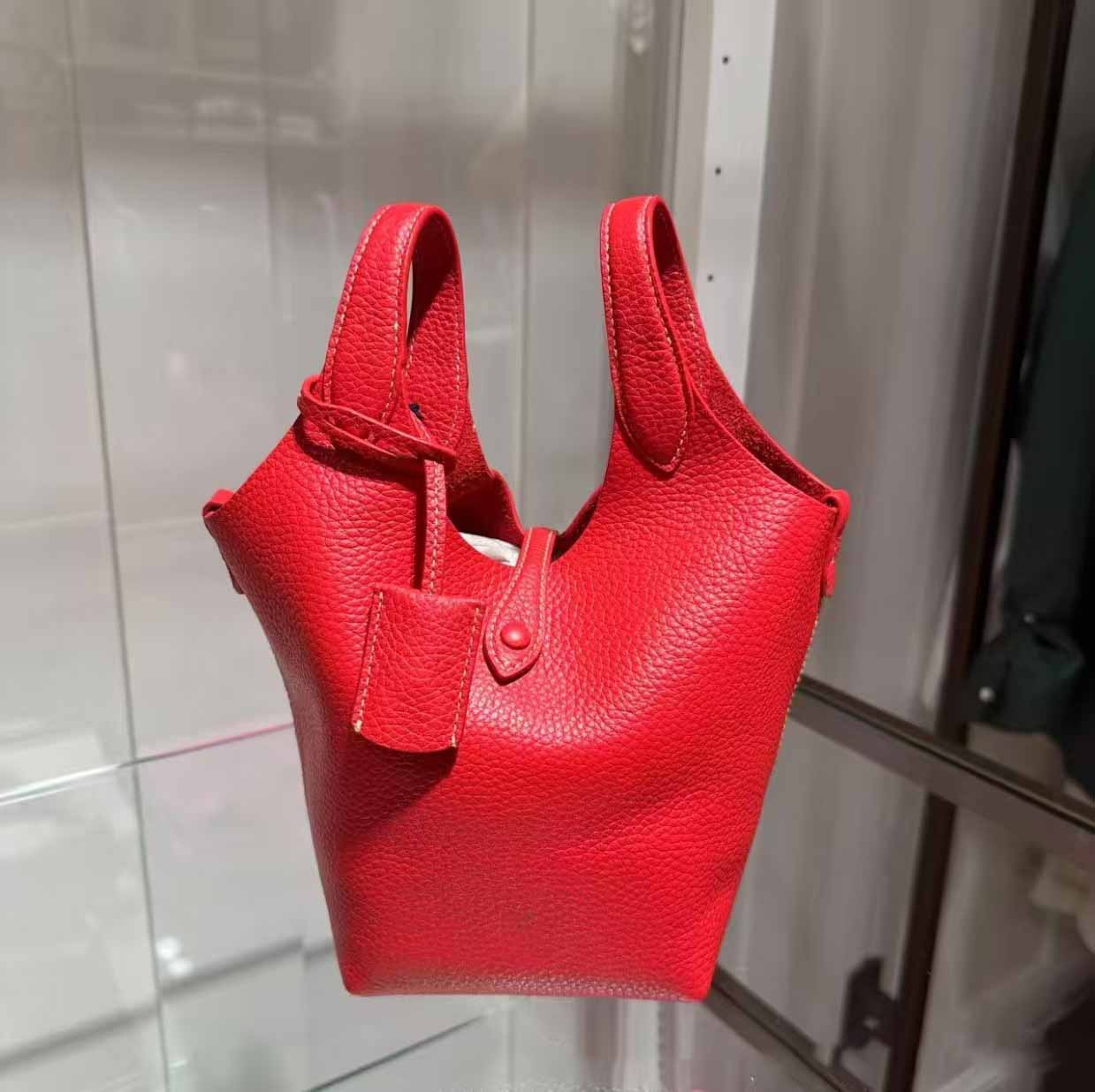 Women's new bucket bag lychee grain cowhide hand bill shoulder crossbody bag