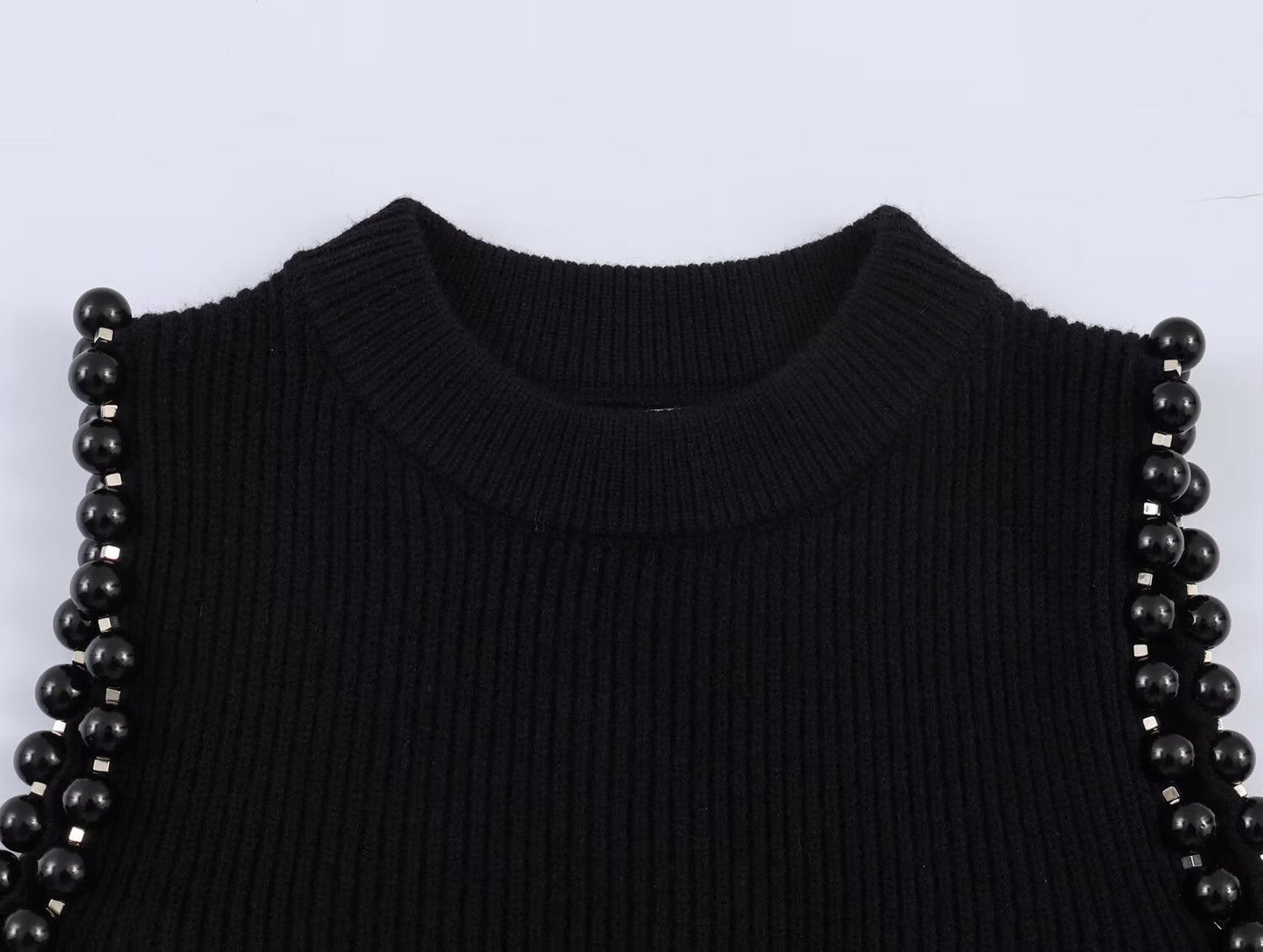 Women's hollow ball decoration O Neck knitted sweater
