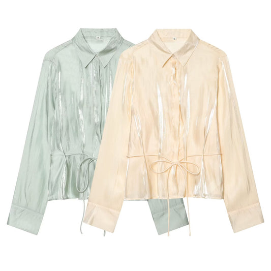 Women's metallic effect paired with belt shirt