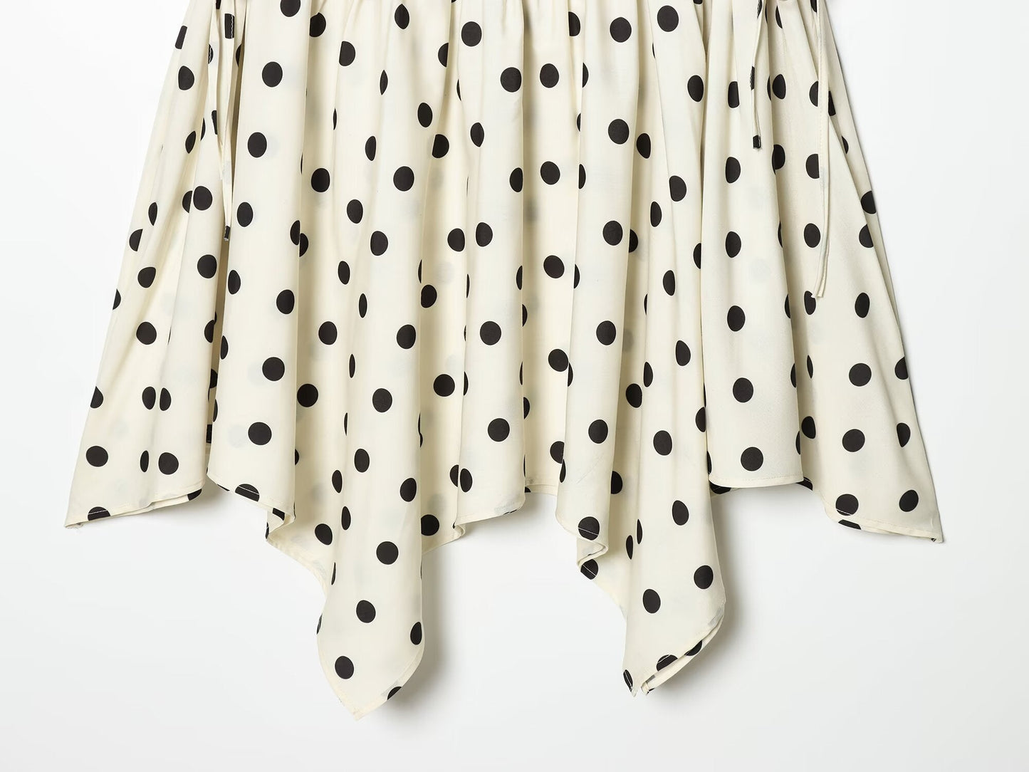 Women's asymmetrical polka dot MIDI skirt