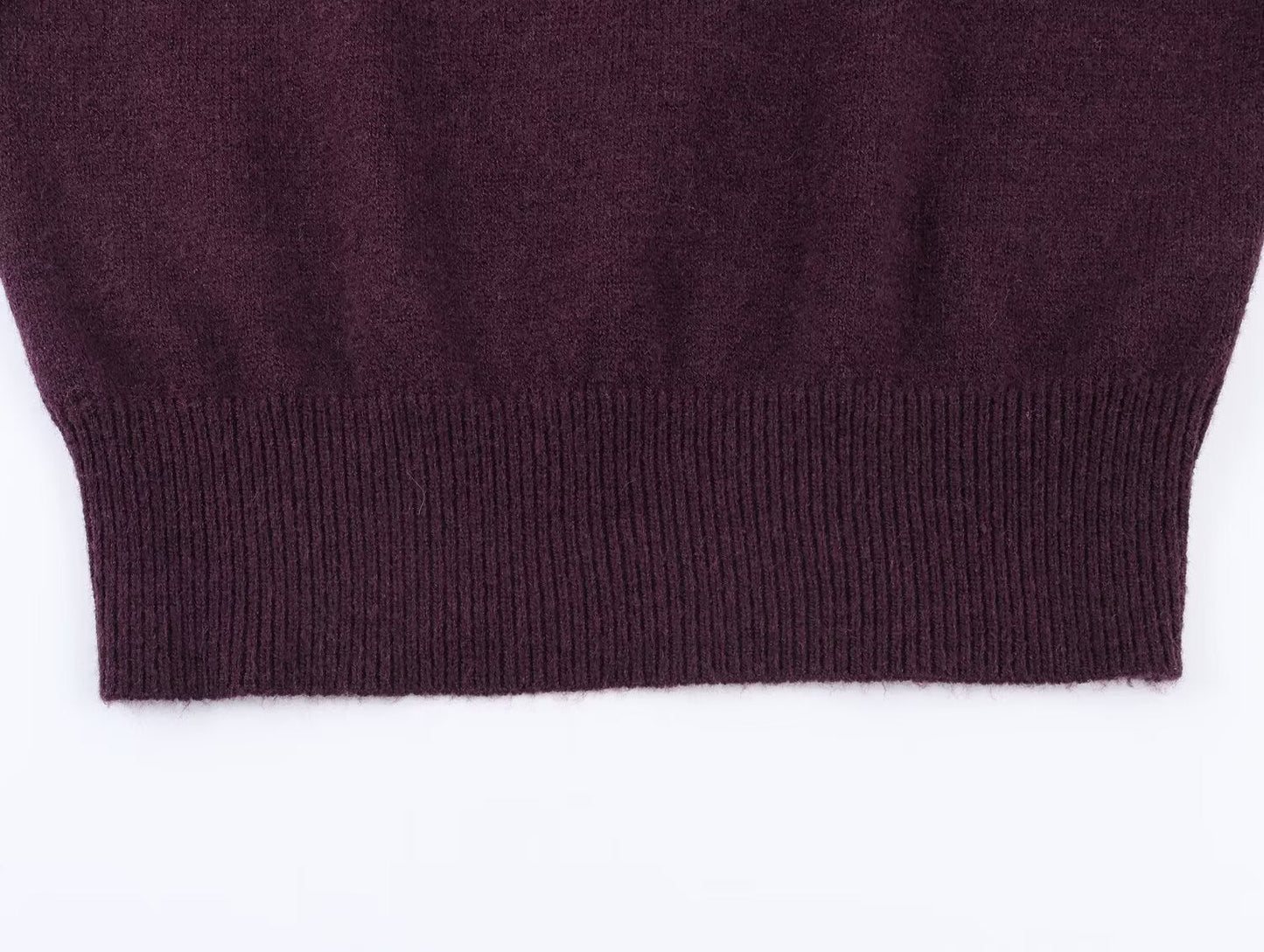Women's long sleeved off shoulder knitted sweater